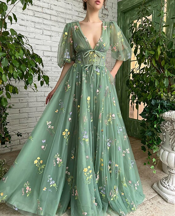 green dress embroidered flowers