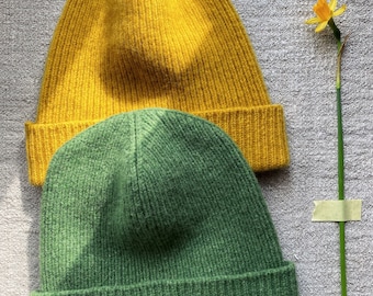 Hand-knitted hats of various colors