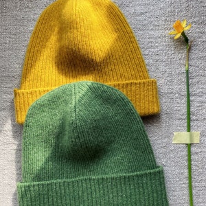 hand-knitted hats in various colors from 100% merino lambswool