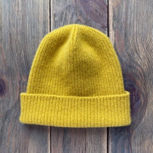 hand-knitted hats in yellow color from 100% merino lambswool