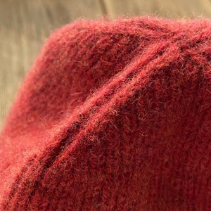 hand-knitted hats in gold red color from 100% merino lambswool