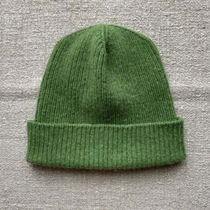 hand-knitted hats in green color from 100% merino lambswool