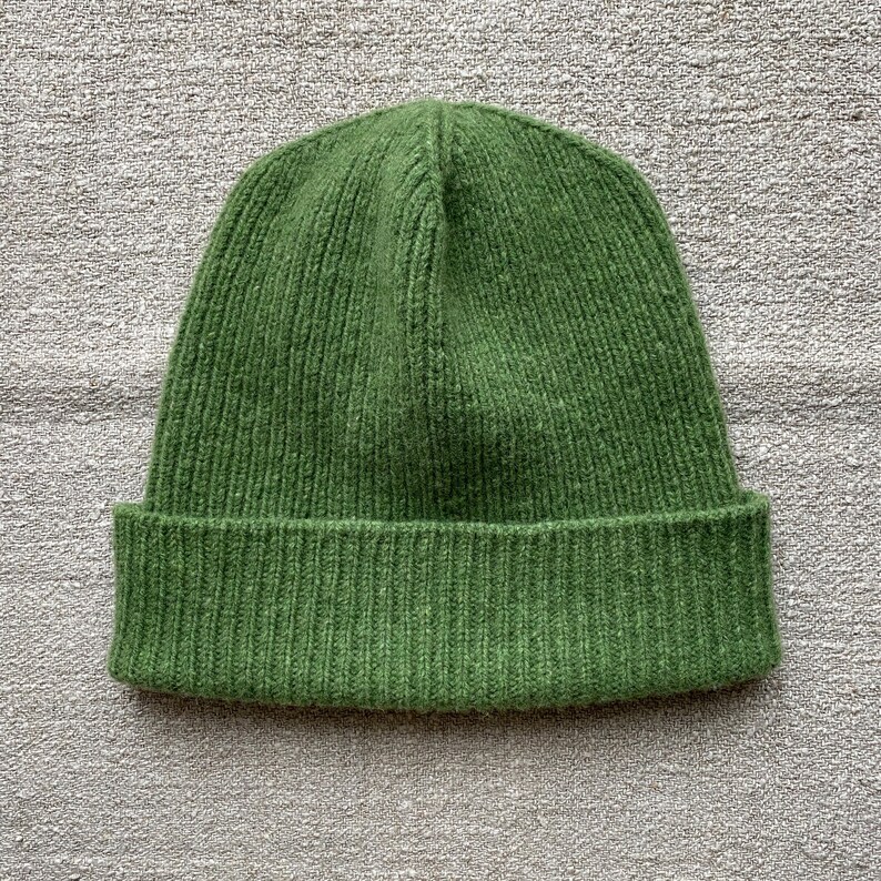 hand-knitted hats in green color from 100% merino lambswool