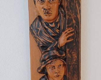 Charlie Chaplin Sculpture, commemorating the 100th (centennial) of the movie "THE KID", which was entirely carved in kambala wood.