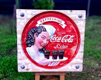 Coca Cola Refreshing Sculpture,referring to advertising from the 1950s,in the purest vintage style,carved directly in exotic wood.(By order)