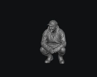 SW9561 Charlie Ireland Kneeling - Clarkson's Farm