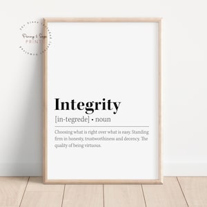 May include: A framed print with the word "Integrity" in bold black font. Below the word is the definition of integrity. The print is in a light wood frame and includes the text "Penny & Sage Prints".