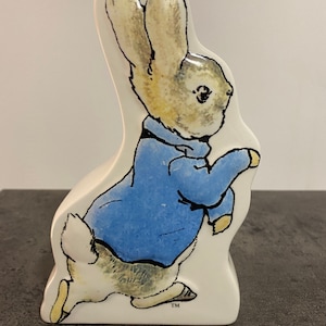 Ceramic Peter Rabbit money box. (144)