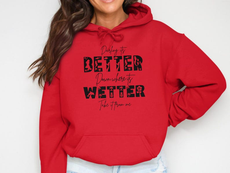 Red hoodie with "Darling it's better Down where it's wetter" text.