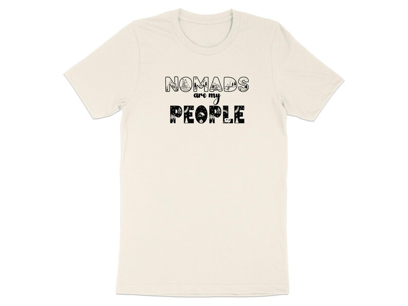 Cream t-shirt with "NOMADS are my PEOPLE" text and illustrations.