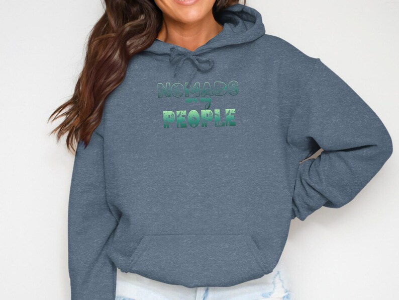 Blue hooded sweatshirt with "NOMADS ARE MY PEOPLE" text.