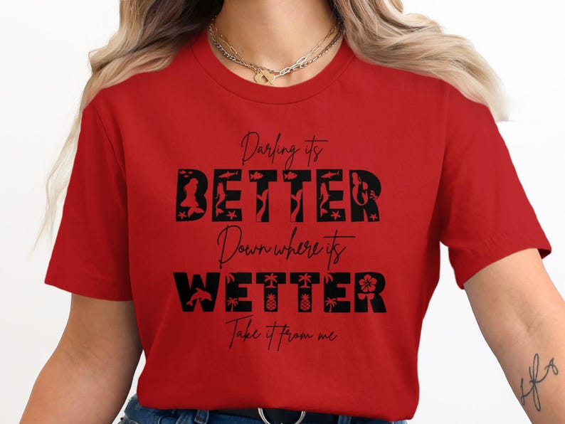 Red t-shirt with black text: Darling it's BETTER Down where it's WETTER Take it from me