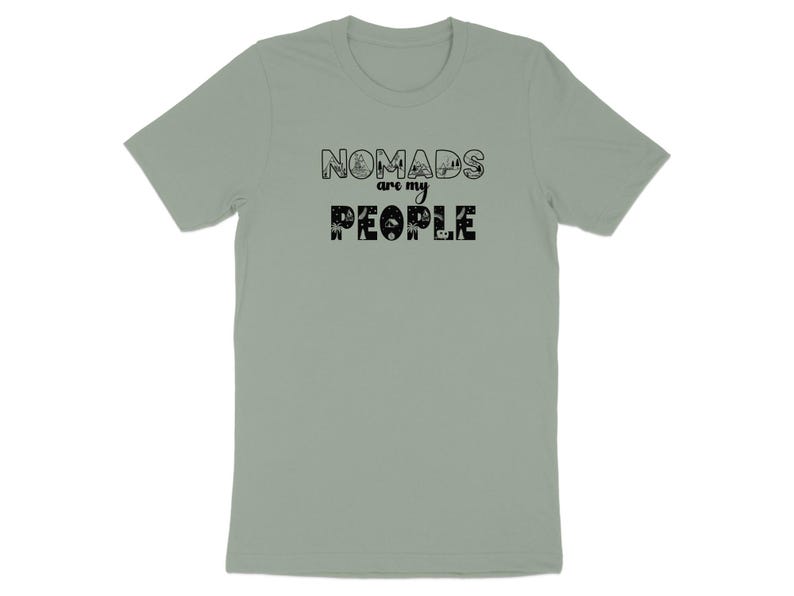 Sage green t-shirt with "NOMADS are my PEOPLE" text and small graphics.