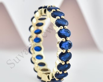 Blauwe saffier Eternity-band: sterlingzilveren trouwring