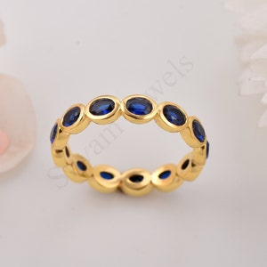 Blue Sapphire Eternity Band: Sterling Silver Promise Ring