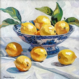 Lemons in blue porcelain bowl