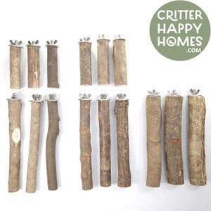 May include: A set of 12 natural wood perches for small pets, each with a metal attachment for easy cage placement. The perches are various sizes and shapes, providing a variety of textures for chewing and climbing.