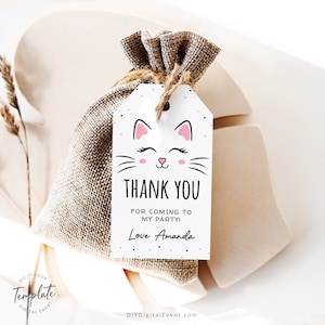 May include: White thank you favor tag with a pink and black cat illustration. The text reads "Thank You for coming to my party! Love Amanda".