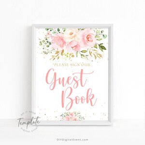 May include: A printable sign with a pink floral design and gold glitter. The text on the sign reads "Please sign our Guest Book".