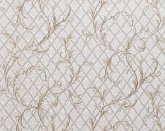 May include: White wallpaper with a beige, embossed, floral pattern. The pattern features a repeating design of stylized leaves and vines within a diamond-shaped grid.