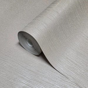 May include: A roll of light gray wallpaper featuring a subtle, fine-grained horizontal texture. The material has a soft, matte finish with a consistent, neutral tone throughout the surface, showing a tightly wound cylindrical core at the end.