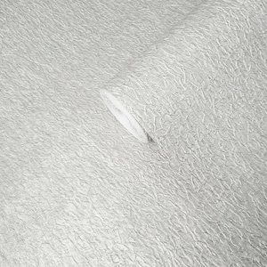 May include: A roll of silver textured wallpaper with a subtle embossed pattern.