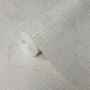 May include: A roll of beige wallpaper with a textured diamond pattern. The wallpaper has a subtle sheen and a slightly raised surface.