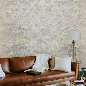 Carta da parati con texture in finto intonaco vintage in finta crema color oro marrone chiaro opaco immagine 1