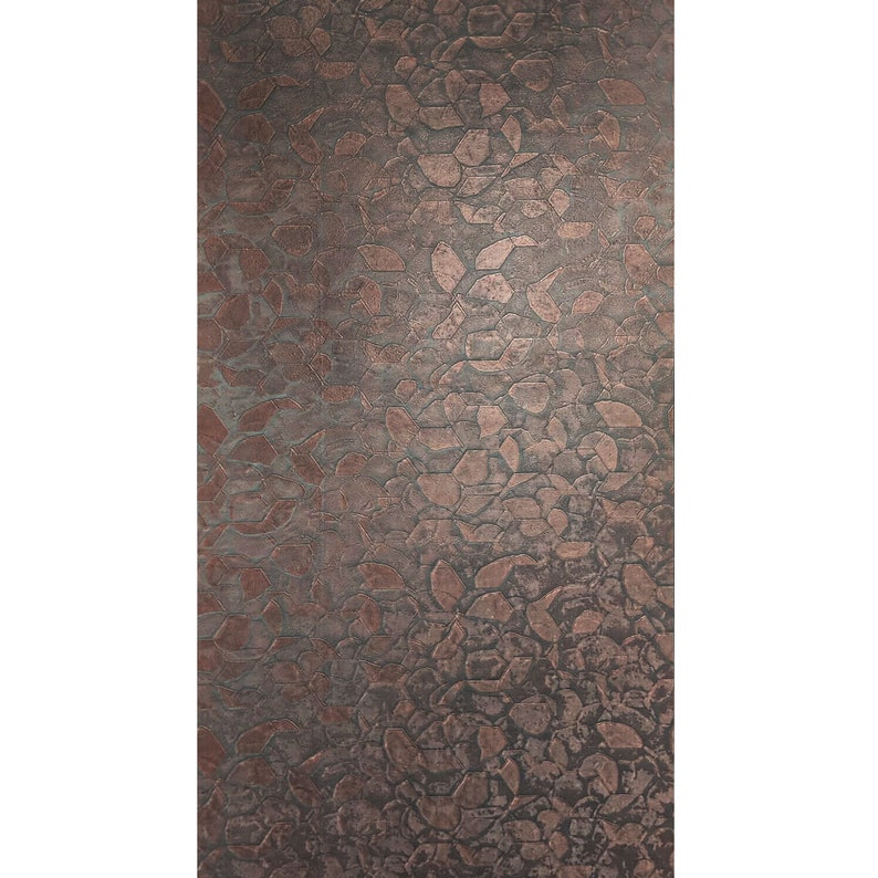 May include: A textured metallic wallpaper with a copper and grey colour scheme. The wallpaper features a repeating pattern of abstract shapes resembling leaves.