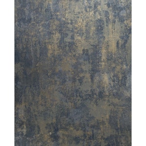 May include: A textured wallpaper with a dark blue and gold metallic finish. The wallpaper has a distressed look, with areas of faded gold and darker blue.
