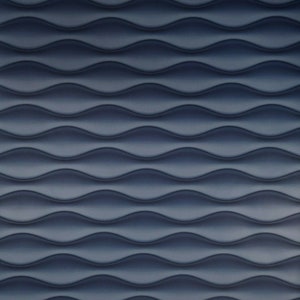 May include: A dark blue textured wall with a repeating wave pattern.