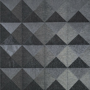 May include: A black and gray geometric pattern wallpaper with a textured, 3D effect. The pattern is made up of repeating diamond shapes.