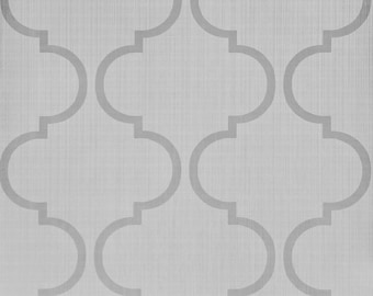 May include: A light gray wallpaper with a repeating pattern of interlocking quatrefoil shapes in a slightly darker shade of gray. The background has a subtle textured appearance.