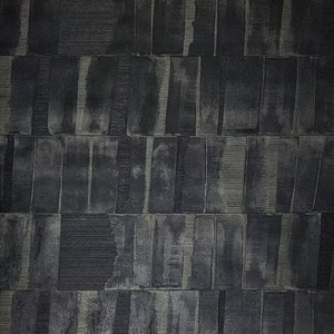 May include: A black and gray textured wallpaper with a geometric pattern of vertical and horizontal lines.