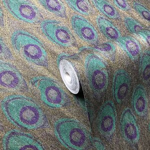 May include: A roll of teal and purple peacock feather patterned wallpaper with a gold glitter background.