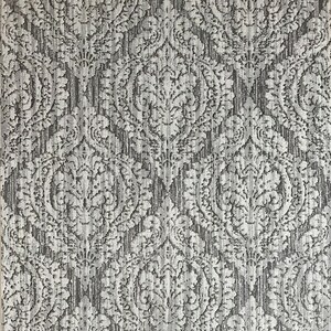 May include: A close-up of a white and gray patterned fabric with a damask design. The fabric has a textured surface and a subtle sheen.