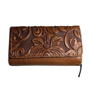 Konzept Vintage Western Brown geschnitzte Blume Brieftasche Indie Retro Leder