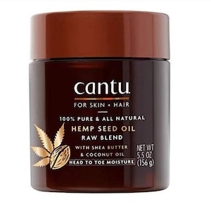 May include: A brown jar of Cantu Hemp Seed Oil Raw Blend for skin and hair. The label includes text: "100% Pure & All Natural" and "Head to Toe Moisture." The jar contains 5.5 oz (156 g) of product.
