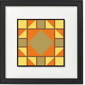 Pode incluir: Uma impressão de arte geométrica emoldurada com um design pixelizado em tons de amarelo, laranja e castanho. A obra de arte está centrada dentro de uma moldura branca e fechada em uma moldura preta, criando uma estética moderna.