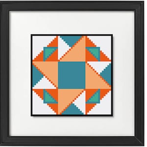 May include: A framed geometric art print featuring a colorful design. The artwork showcases a central teal square surrounded by orange, white, and teal triangles. The print is framed in a black frame with a white mat.