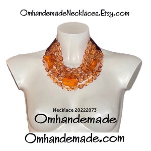 20222073 orange hazelnut necklace, bib necklace, multi-strand relief layered necklace in resin and leather, Fairchil Baldwin style necklace