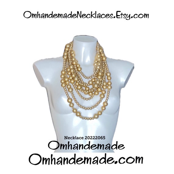 20222065 golden necklace, bib necklace, multi-strand necklace, layered necklace, relief necklace, gold necklace, chunky necklace, maxi necklace