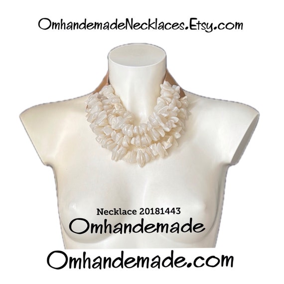 20181443 cream necklace, bib necklace, chunky necklace, multi-strand necklace, layered relief necklace, necklace with stretch bracelet