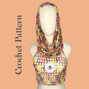 May include: A crochet top and matching hooded scarf in a colorful pattern of red, yellow, and gray. The top is a loose-fitting, open-weave design with a square pattern. The scarf is a thick, chunky knit with a similar color scheme. The text "CREATIONS BY THE HONEY BEE" is visible on the top.