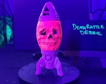 Death Rattle Debbie - Blacklight & Glow in the Dark Skull Bomb Statue (6")