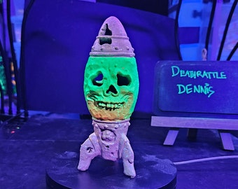 Death Rattle Dennis - Blacklight & Glow in the Dark Skull Bomb Statue (6&quot;)