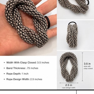 May include: A silver-toned rope knot bracelet. The bracelet is 3.5 inches wide with the clasp closed and has a rope design width of 2.5 inches. The band thickness is .75 inches, and the rope depth is 1 inch. The bracelet is shown in multiple views.