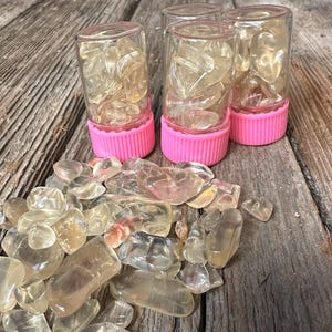 May include: A set of three ceramic mugs with a speckled, matte finish. The mugs are in shades of cream, light brown, and dark brown. Each mug has a simple, minimalist design, perfect for coffee or tea.