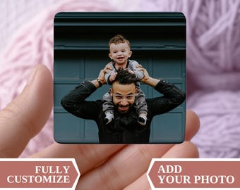 May include: A square, personalized photo product held in a hand. The image on the product shows a man with a child on his shoulders. Text on the product reads "FULLY CUSTOMIZE" and "ADD YOUR PHOTO". The Myra Grace Co. logo is also visible.