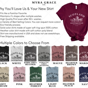 May include: A maroon t-shirt with a white graphic of a Scottish castle and the word "SCOTLAND". Below the graphic is the text "nemo me impune lacessit" and "UNITED KINGDOM EST. 1843". The shirt is available in multiple colors.